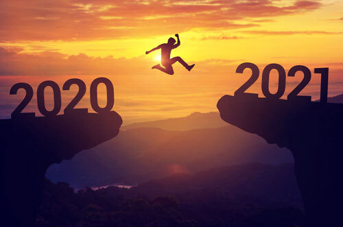 Man leaping from 2020 to 2021